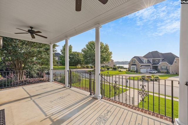 104 Eastshore Dr, Lexington, SC 29072 - porch featuring ceiling fan, a residential view, and a lawn