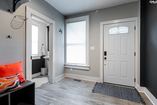 2808 River Dr, Columbia, SC 29201 - foyer entrance featuring light wood-type flooring and baseboards