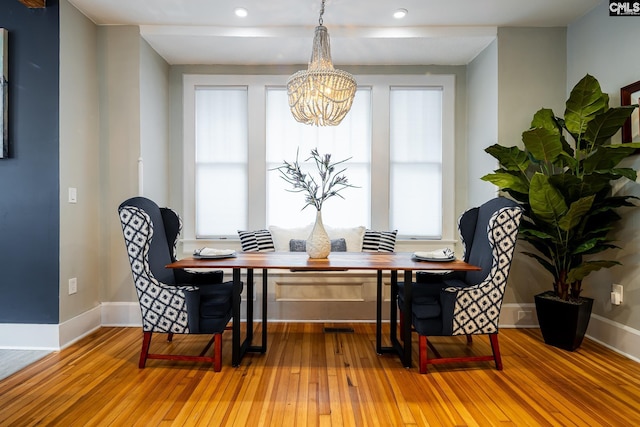 2808 River Dr, Columbia, SC 29201 - dining room with a chandelier, baseboards, wood-type flooring, and recessed lighting
