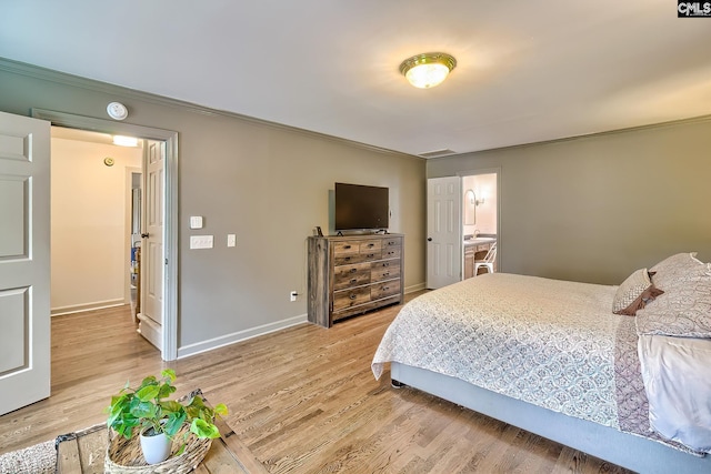 205 Weeping Cherry Ln, Columbia, SC 29212 - bedroom featuring ornamental molding, light wood finished floors, and baseboards
