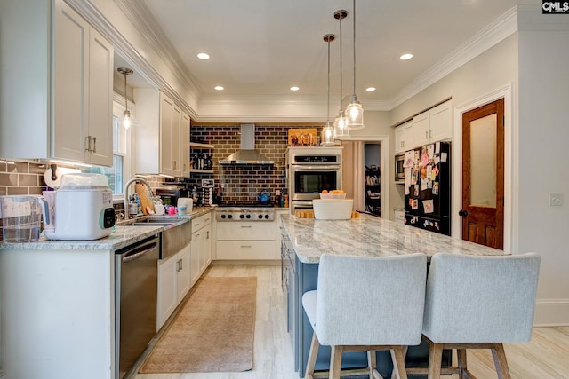 108 Shallow Brook Dr, Columbia, SC 29223 - kitchen with appliances with stainless steel finishes, wall chimney range hood, a center island, a sink, and decorative backsplash
