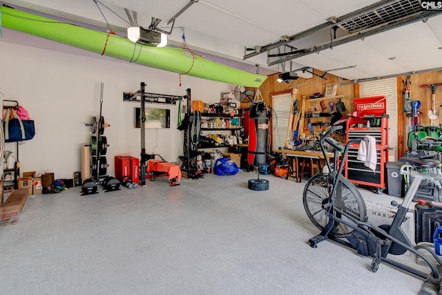 108 Shallow Brook Dr, Columbia, SC 29223 - garage with a garage door opener and a workshop area