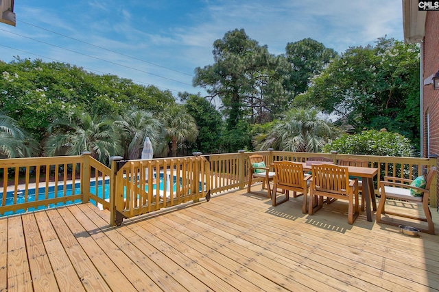 108 Shallow Brook Dr, Columbia, SC 29223 - deck with outdoor dining space and view of wooded area