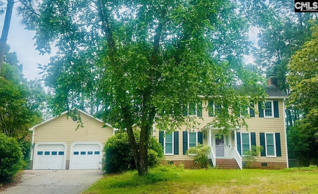 112 Valhalla Dr, Columbia, SC 29229 - view of front facade with a front lawn, concrete driveway, a chimney, and an attached garage
