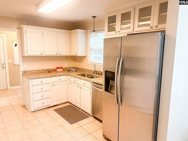 112 Valhalla Dr, Columbia, SC 29229 - kitchen with appliances with stainless steel finishes, a sink, crown molding, light tile patterned flooring, and glass insert cabinets