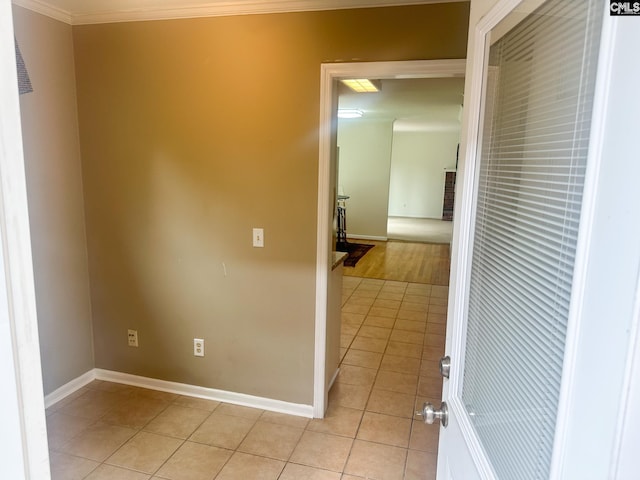 112 Valhalla Dr, Columbia, SC 29229 - hallway featuring crown molding, light tile patterned floors, and baseboards