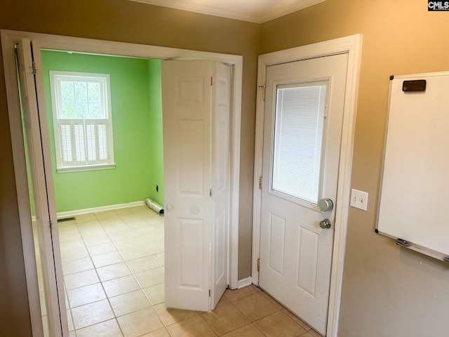 112 Valhalla Dr, Columbia, SC 29229 - doorway with light tile patterned flooring, ornamental molding, and baseboards