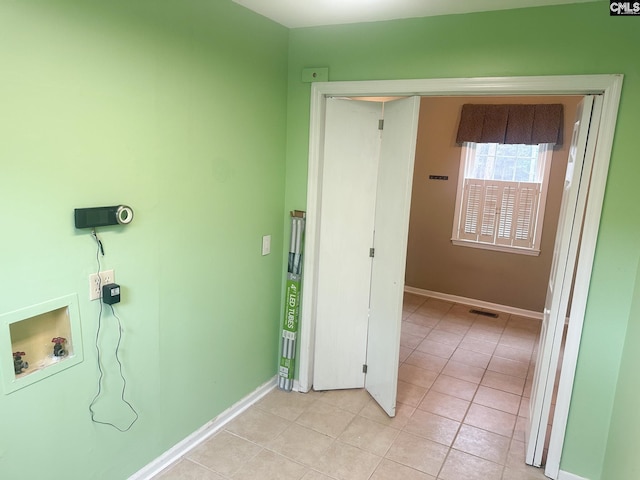 112 Valhalla Dr, Columbia, SC 29229 - laundry room featuring hookup for a washing machine, baseboards, and light tile patterned floors