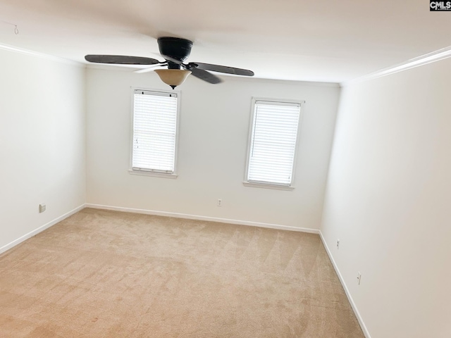 112 Valhalla Dr, Columbia, SC 29229 - spare room featuring light carpet, ornamental molding, baseboards, and a ceiling fan