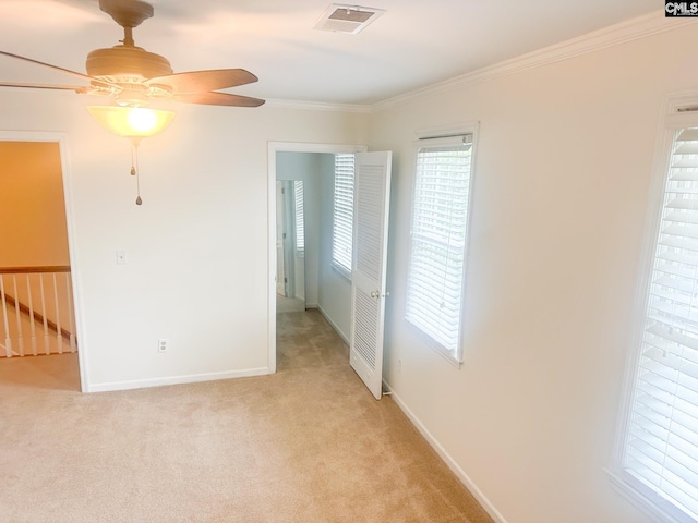112 Valhalla Dr, Columbia, SC 29229 - unfurnished room featuring light carpet, crown molding, ceiling fan, and baseboards