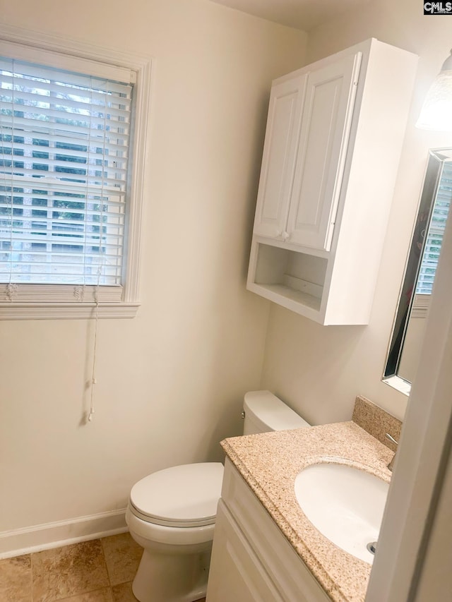 112 Valhalla Dr, Columbia, SC 29229 - bathroom featuring vanity, toilet, baseboards, and tile patterned floors