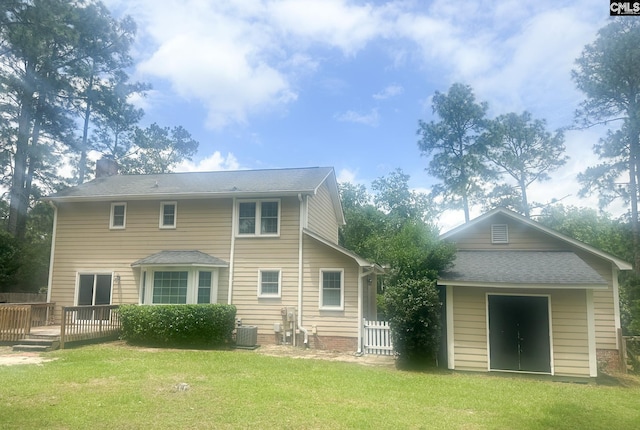 112 Valhalla Dr, Columbia, SC 29229 - rear view of house with central AC unit, a deck, and a yard