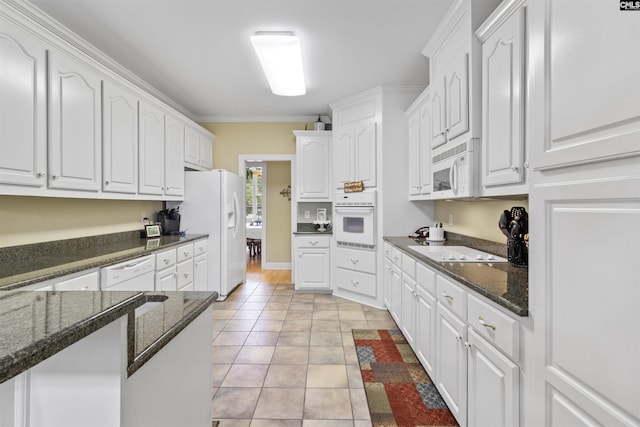 6 Hunting Glen Ct, Irmo, SC 29063 - kitchen with white appliances, white cabinetry, light tile patterned floors, dark stone counters, and crown molding