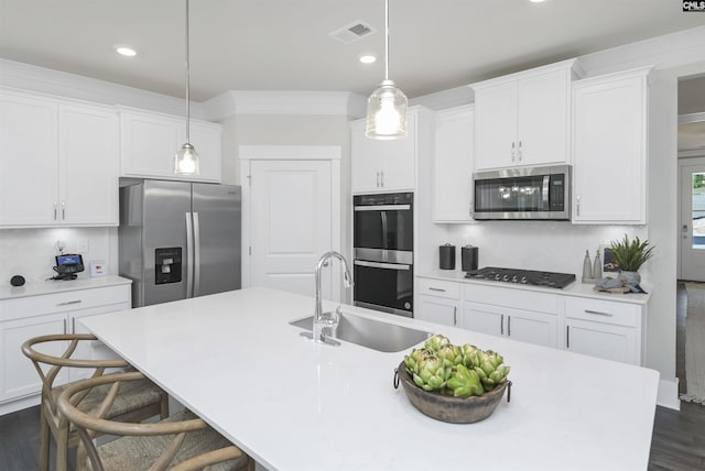 2451 Thode Ln, Lexington, SC 29072 - kitchen featuring stainless steel appliances, a sink, dark wood-style floors, white cabinets, and recessed lighting