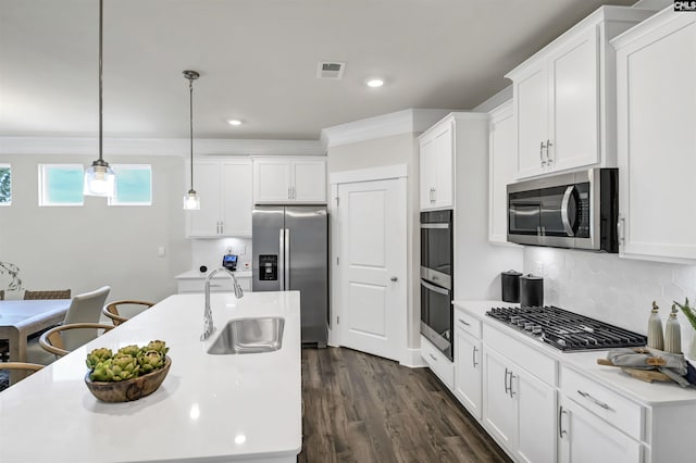 2451 Thode Ln, Lexington, SC 29072 - kitchen with appliances with stainless steel finishes, a sink, light countertops, white cabinetry, and decorative backsplash