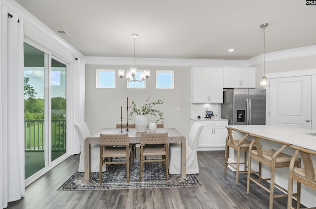 2451 Thode Ln, Lexington, SC 29072 - dining area featuring a chandelier, dark wood finished floors, recessed lighting, and crown molding
