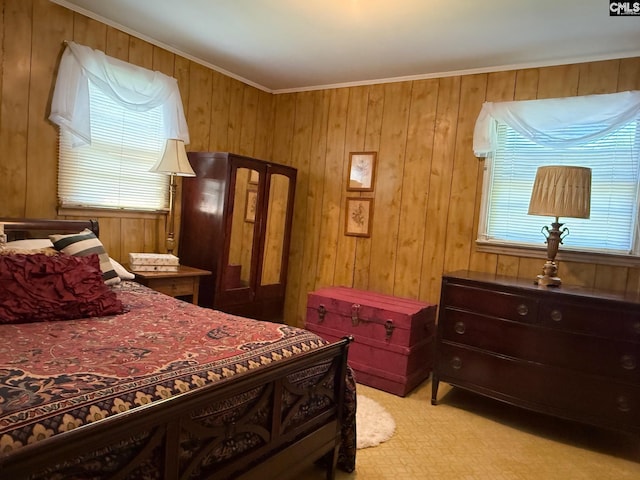 714 E Dunlap St, Lancaster, SC 29720 - bedroom with multiple windows, ornamental molding, and wood walls
