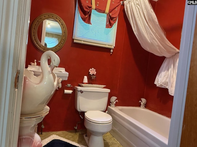 714 E Dunlap St, Lancaster, SC 29720 - full bathroom featuring toilet, a bath, and tile patterned floors