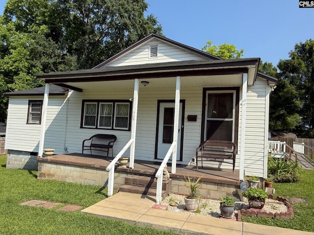 714 E Dunlap St, Lancaster, SC 29720 - view of front of house with a porch