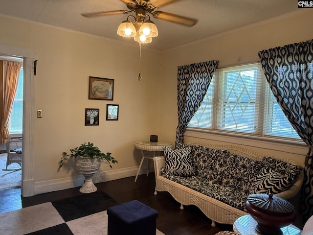 714 E Dunlap St, Lancaster, SC 29720 - living area with a ceiling fan, baseboards, wood finished floors, and crown molding