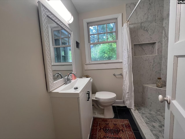 2611 Mills Dr, Columbia, SC 29204 - bathroom featuring toilet, tile patterned floors, vanity, and curtained shower