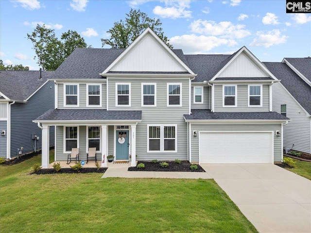 521 Fenwick Dr, Woodruff, SC 29388 - view of front of house with a porch, board and batten siding, concrete driveway, a front yard, and an attached garage