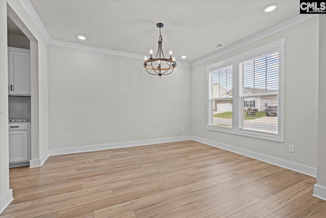 521 Fenwick Dr, Woodruff, SC 29388 - spare room featuring a chandelier, ornamental molding, light wood-style flooring, baseboards, and recessed lighting