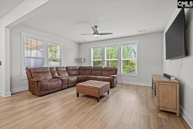 521 Fenwick Dr, Woodruff, SC 29388 - living room with a ceiling fan, healthy amount of natural light, baseboards, and light wood-style flooring