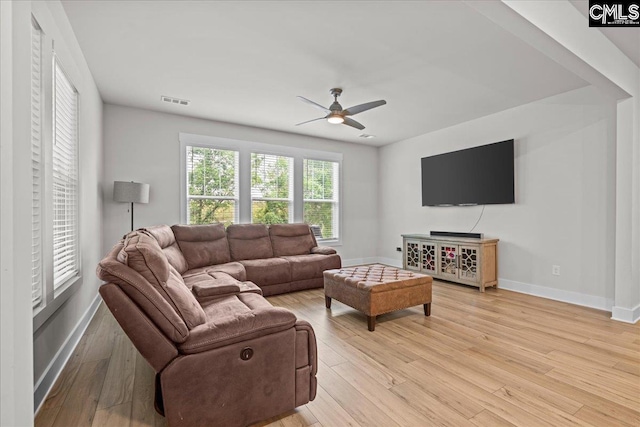 521 Fenwick Dr, Woodruff, SC 29388 - living area with ceiling fan, light wood-style floors, and baseboards