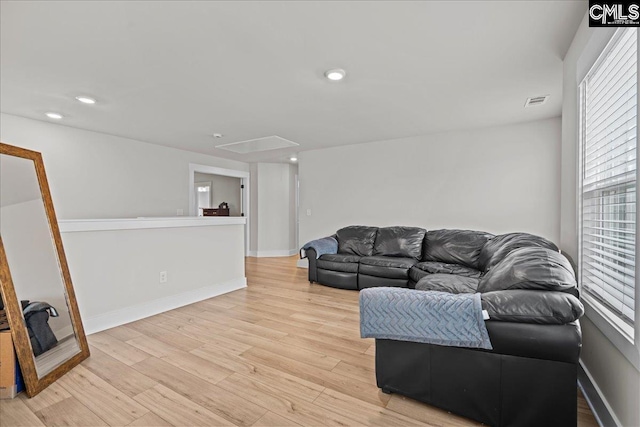 521 Fenwick Dr, Woodruff, SC 29388 - living area with attic access, light wood-type flooring, plenty of natural light, recessed lighting, and baseboards