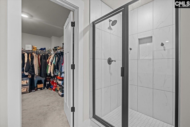 521 Fenwick Dr, Woodruff, SC 29388 - bathroom featuring a stall shower and a spacious closet
