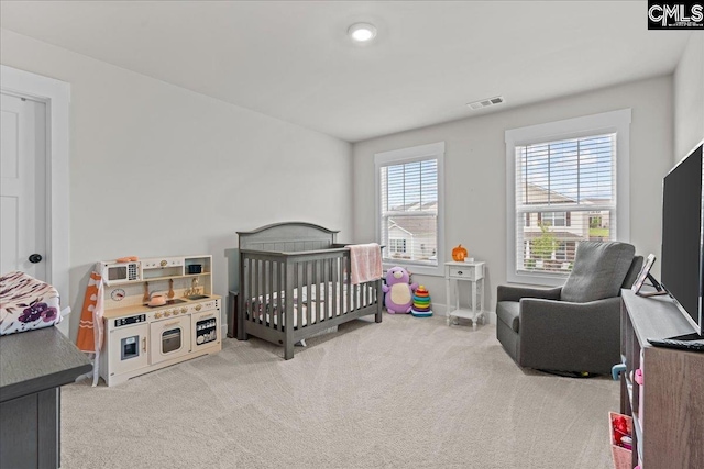 521 Fenwick Dr, Woodruff, SC 29388 - carpeted bedroom featuring a nursery area