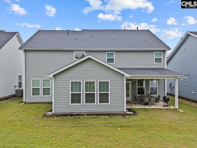 521 Fenwick Dr, Woodruff, SC 29388 - rear view of house featuring a patio area, a yard, central AC unit, and roof with shingles