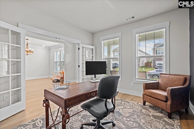 521 Fenwick Dr, Woodruff, SC 29388 - office area featuring light wood-style floors, baseboards, a chandelier, and ornamental molding