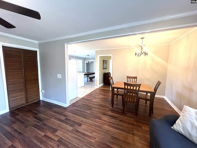 1432 Karlaney Ave, Cayce, SC 29033 - dining room with a chandelier, wood finished floors, ceiling fan, baseboards, and crown molding