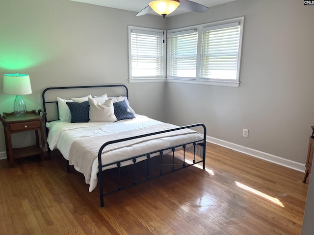 1432 Karlaney Ave, Cayce, SC 29033 - bedroom featuring baseboards, wood finished floors, and ceiling fan