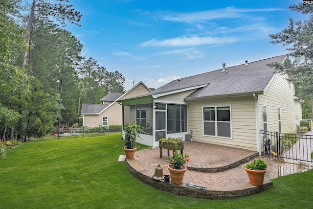 383 Summersweet Ct, Blythewood, SC 29016 - back of property featuring a sunroom, a shingled roof, and a patio