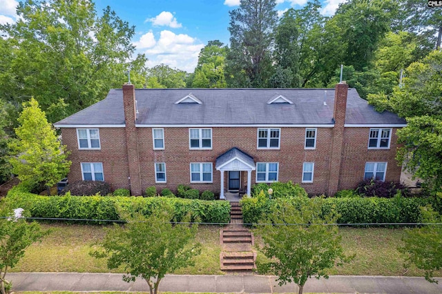 3407 River Dr Unit D, Columbia, SC 29201 - view of front facade featuring a chimney and brick siding