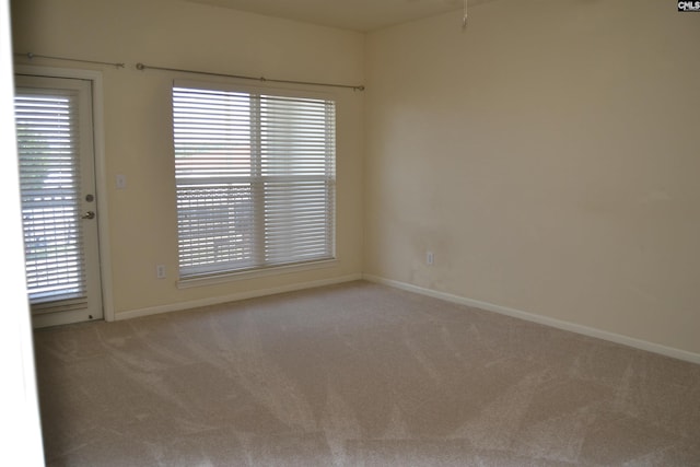 1085 Shop Rd Unit 226, Columbia, SC 29201 - carpeted spare room featuring baseboards and healthy amount of natural light