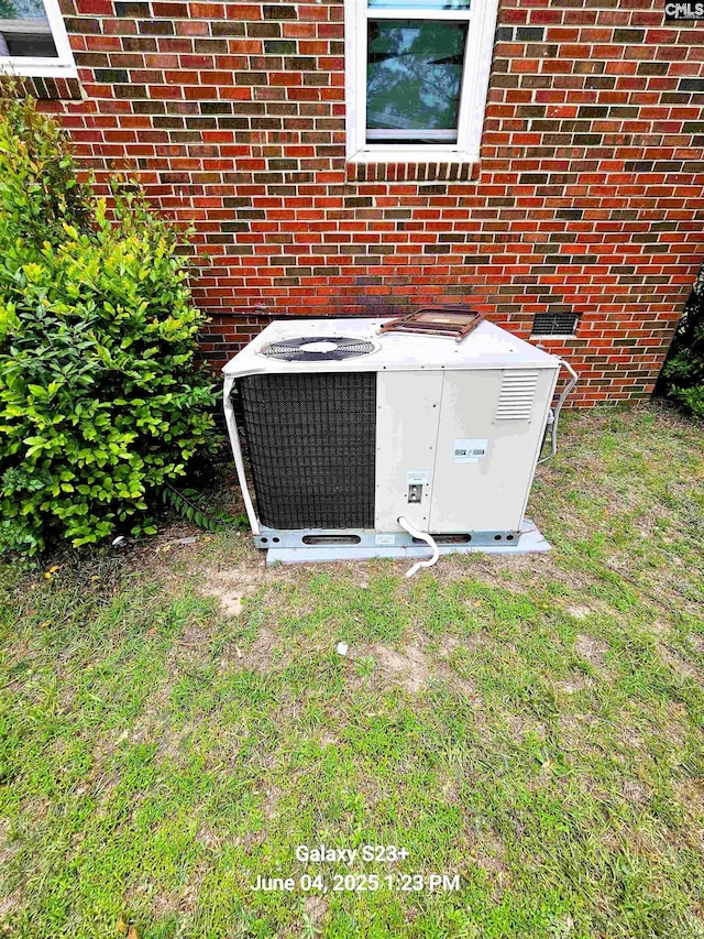 177 Newcastle Dr, Columbia, SC 29223 - exterior view of central AC unit, brick siding, and crawl space