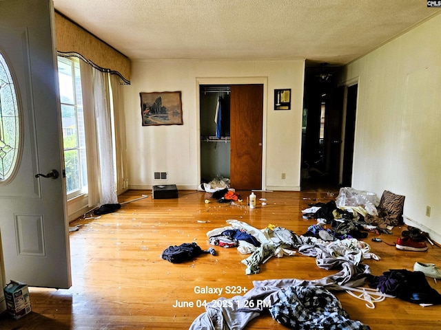 177 Newcastle Dr, Columbia, SC 29223 - unfurnished bedroom with a textured ceiling, wood finished floors, and a closet