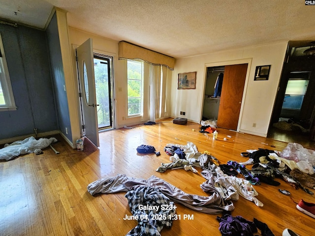 177 Newcastle Dr, Columbia, SC 29223 - spare room featuring wood finished floors, a textured ceiling, and baseboards