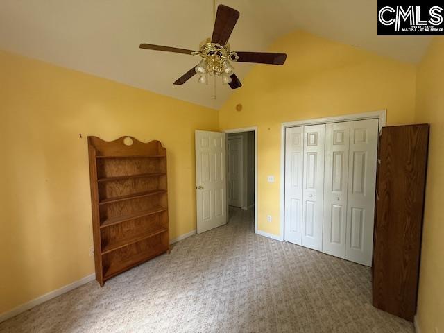 12 Beech Branch Ct, Irmo, SC 29063 - bedroom featuring carpet, high vaulted ceiling, a closet, baseboards, and ceiling fan