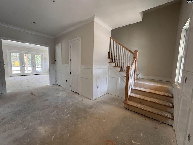 147 Harborside Cir, Columbia, SC 29229 - entryway with french doors, stairs, ornamental molding, wainscoting, and concrete flooring