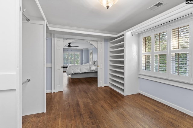 415 Pine St, Camden, SC 29020 - spacious closet with wood finished floors and ceiling fan