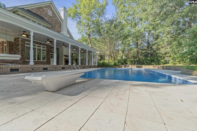 415 Pine St, Camden, SC 29020 - swimming pool with a ceiling fan and a patio