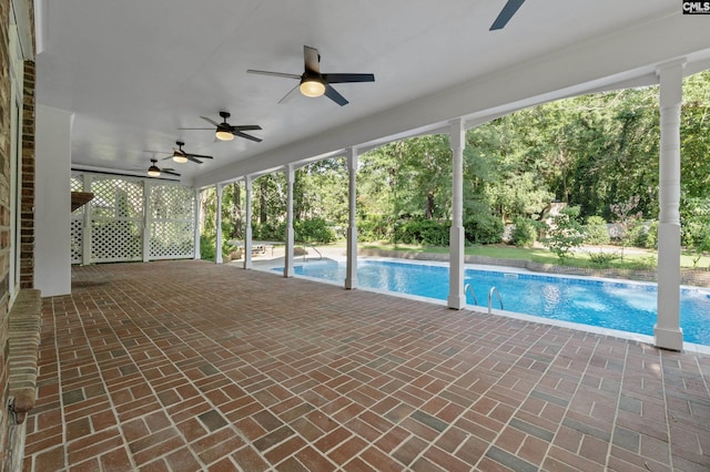 415 Pine St, Camden, SC 29020 - swimming pool with ceiling fan, view of scattered trees, and a patio