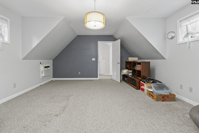 415 Pine St, Camden, SC 29020 - bonus room featuring carpet floors, vaulted ceiling, baseboards, and an AC wall unit