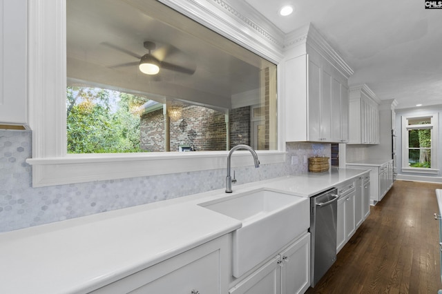 415 Pine St, Camden, SC 29020 - kitchen featuring dishwasher, white cabinetry, a sink, light countertops, and a ceiling fan