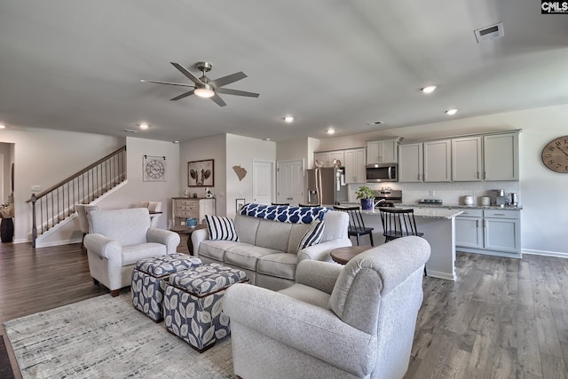 837 Marigold Ln, Lexington, SC 29072 - living room featuring a ceiling fan, recessed lighting, stairway, wood finished floors, and baseboards